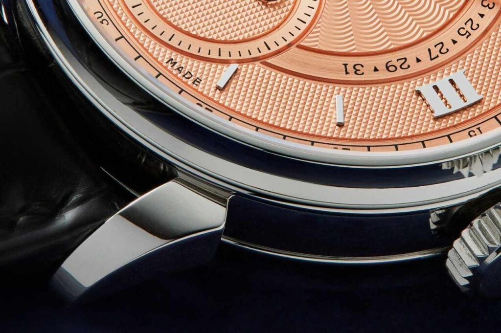 Voutilainen Vingt-8 Salmon Dial Watch for men with silver case, Roman numerals, thin hands and a leather band