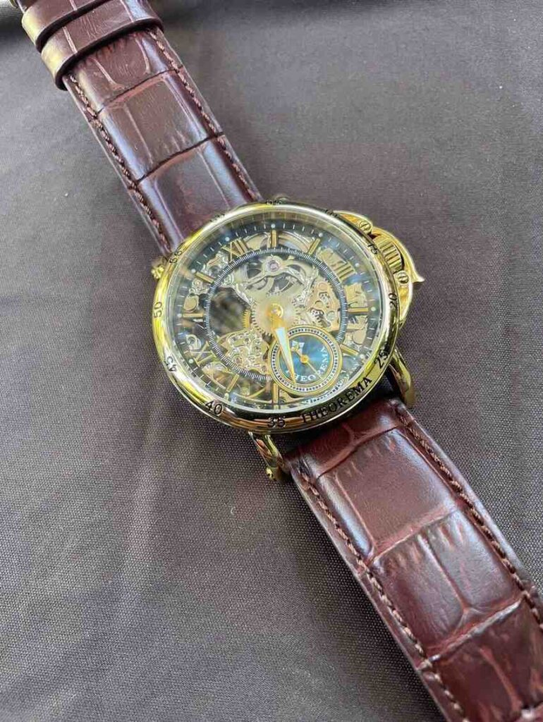 Tufina Theorema Casablanca GM-101-3 Gold mechanical watch for men with a skeleton dial, gold case and brown leather band